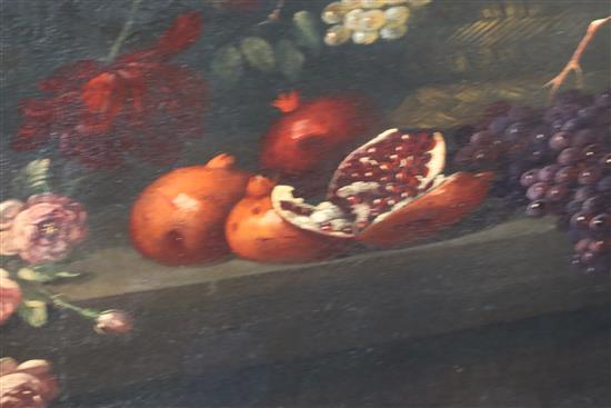 17th century Flemish School Still life of flowers and fruit on a table top 42 x 63in.